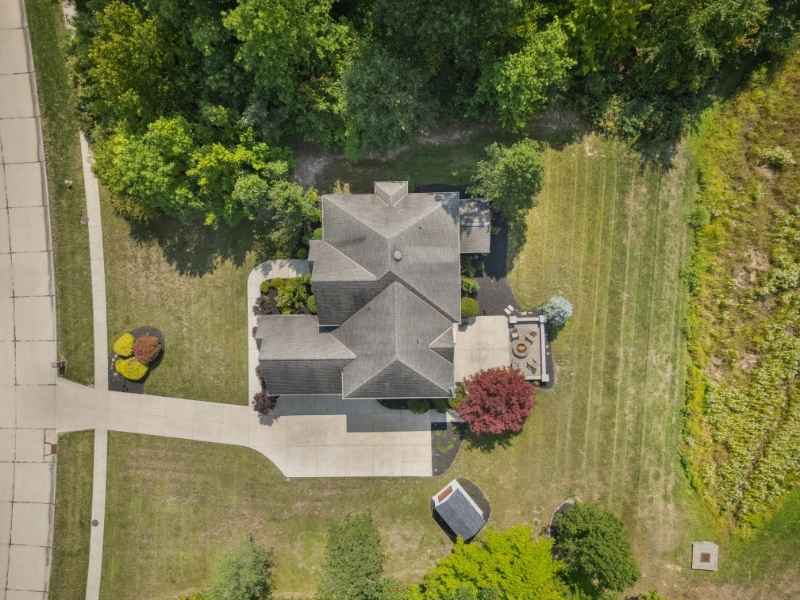 Metes and bounds survey for a residential parcel split in Nashville, Tennessee, showing a home, driveway, yard, and surrounding property area.
